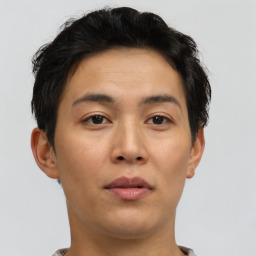 Neutral asian young-adult male with short  brown hair and brown eyes