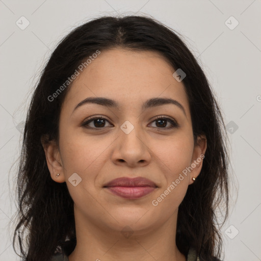 Joyful latino young-adult female with long  brown hair and brown eyes