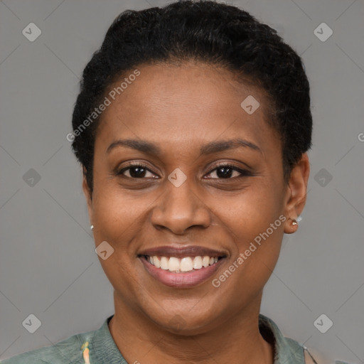 Joyful latino young-adult female with short  brown hair and brown eyes