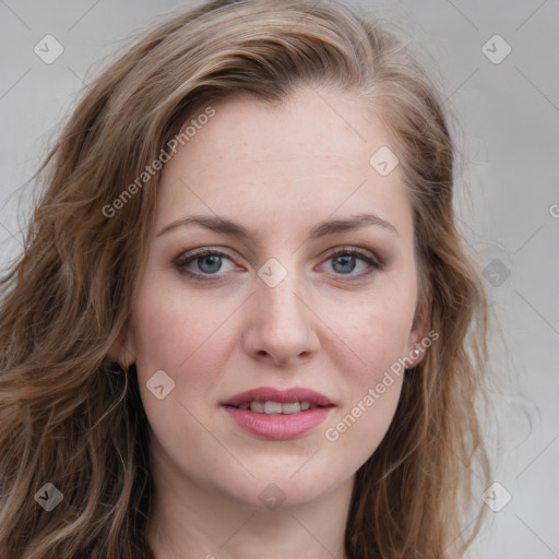 Joyful white young-adult female with long  brown hair and blue eyes