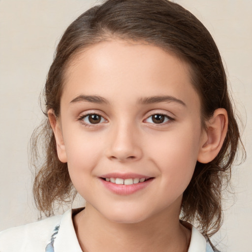 Joyful white child female with medium  brown hair and brown eyes