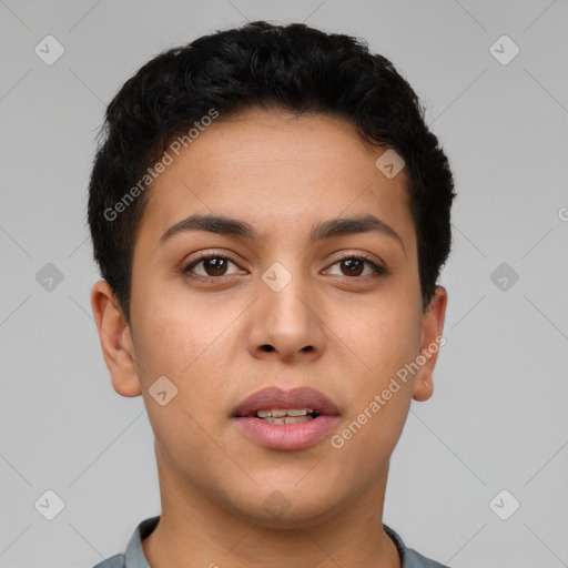 Joyful latino young-adult female with short  brown hair and brown eyes