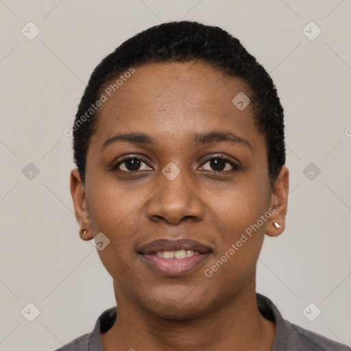 Joyful black young-adult female with short  black hair and brown eyes