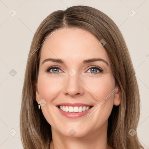 Joyful white young-adult female with medium  brown hair and green eyes