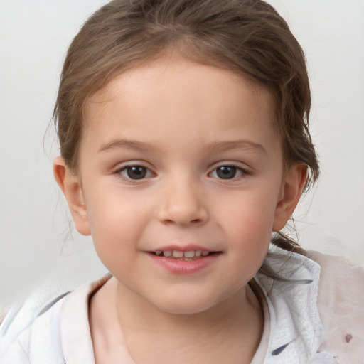 Joyful white child female with medium  brown hair and brown eyes