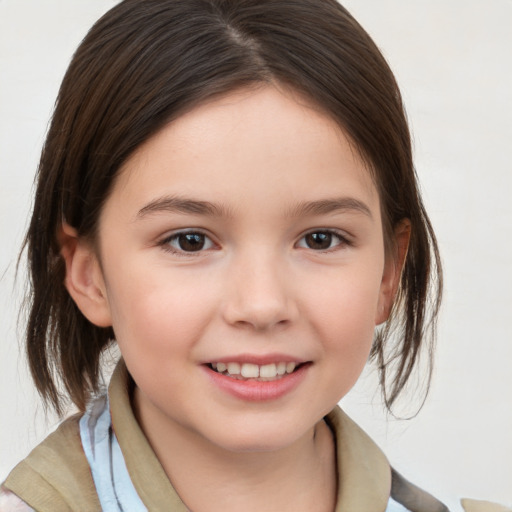 Joyful white child female with medium  brown hair and brown eyes