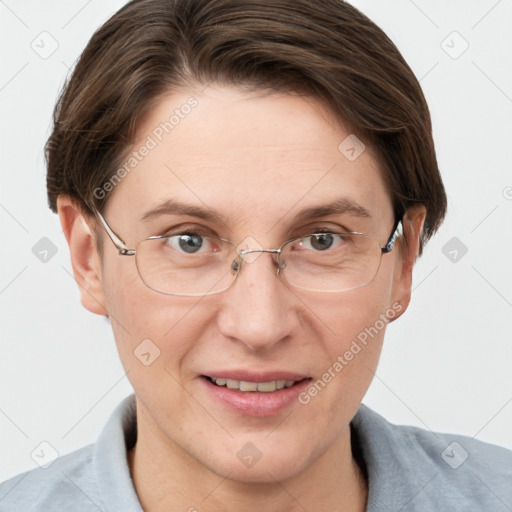 Joyful white adult female with short  brown hair and grey eyes