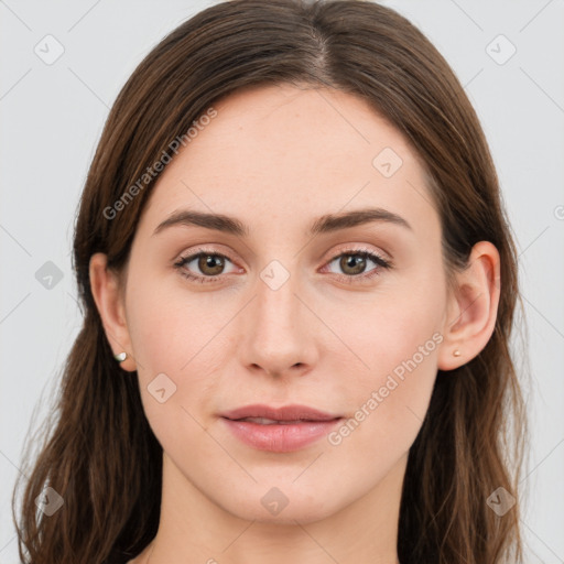 Joyful white young-adult female with long  brown hair and blue eyes