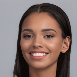 Joyful white young-adult female with long  black hair and brown eyes