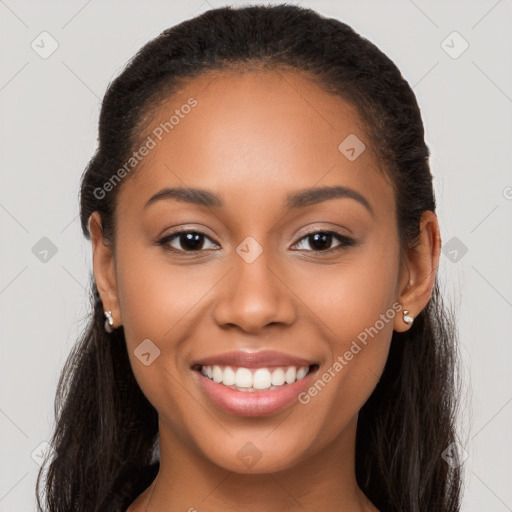 Joyful latino young-adult female with long  brown hair and brown eyes