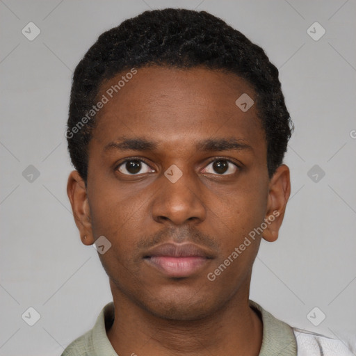 Neutral latino young-adult male with short  brown hair and brown eyes