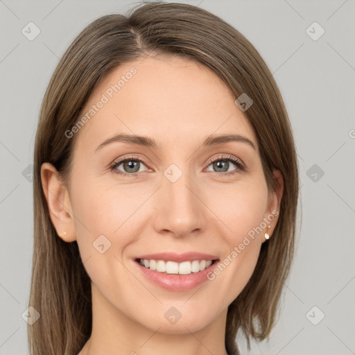 Joyful white young-adult female with long  brown hair and grey eyes