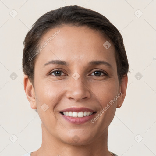 Joyful white young-adult female with short  brown hair and brown eyes