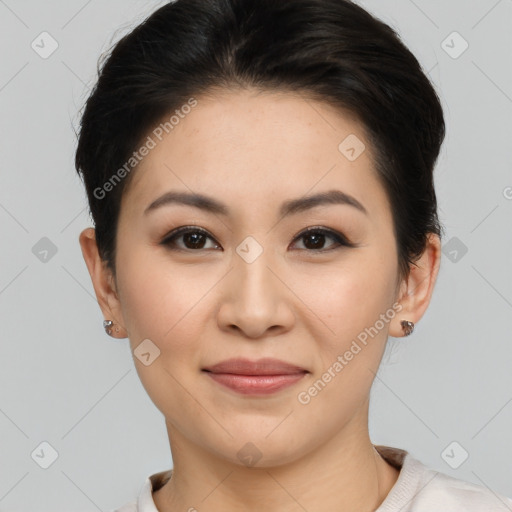 Joyful asian young-adult female with short  brown hair and brown eyes