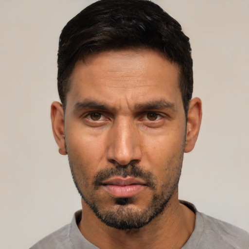Neutral white young-adult male with short  black hair and brown eyes