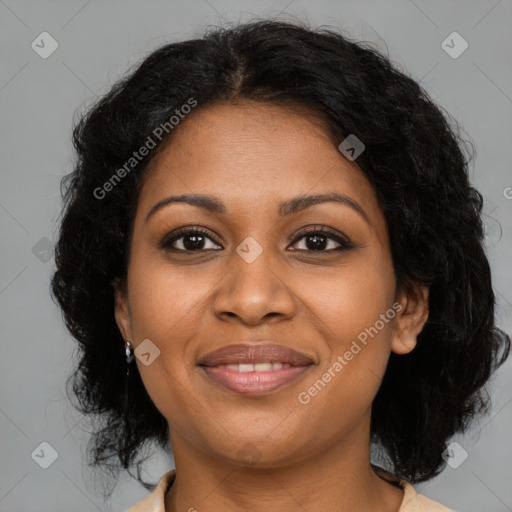 Joyful black young-adult female with medium  brown hair and brown eyes