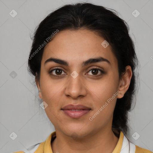 Joyful latino young-adult female with medium  brown hair and brown eyes