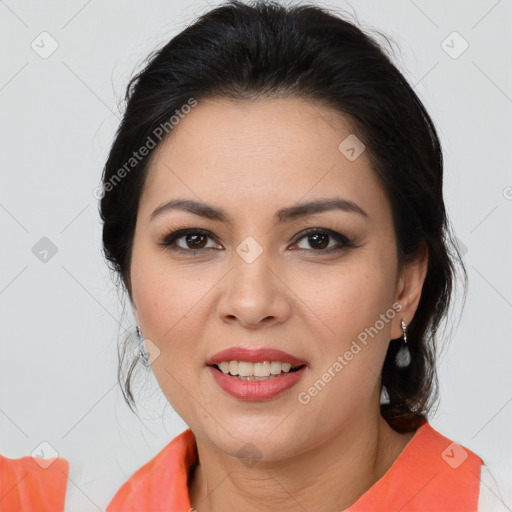 Joyful latino young-adult female with medium  brown hair and brown eyes
