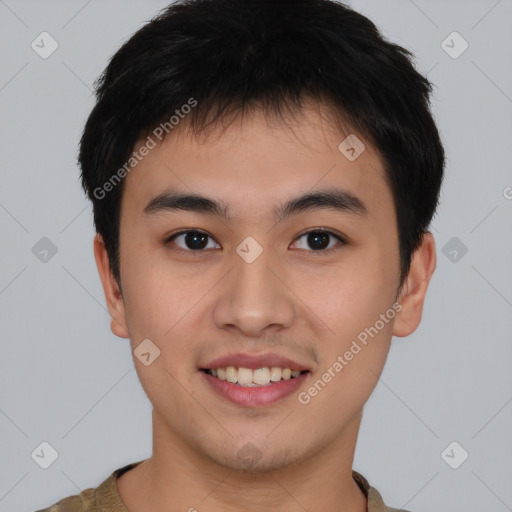 Joyful asian young-adult male with short  brown hair and brown eyes