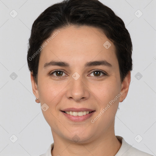 Joyful white young-adult female with short  brown hair and brown eyes