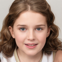 Joyful white child female with medium  brown hair and grey eyes