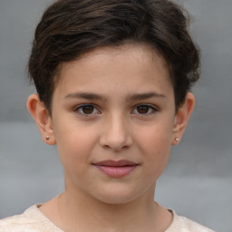 Joyful white child female with short  brown hair and brown eyes