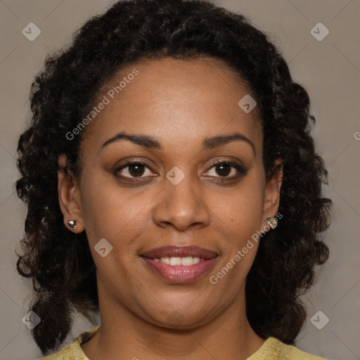 Joyful black young-adult female with medium  brown hair and brown eyes