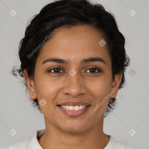 Joyful latino young-adult female with short  brown hair and brown eyes