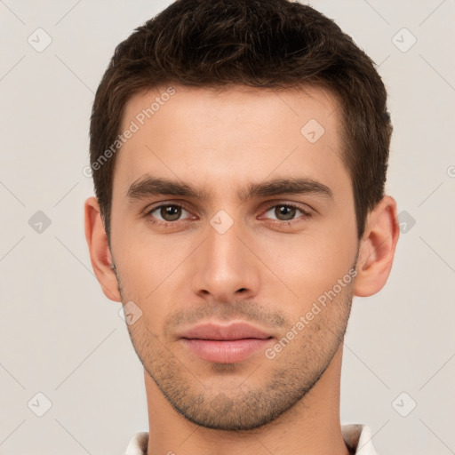 Neutral white young-adult male with short  brown hair and brown eyes