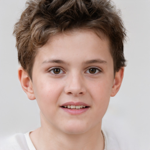 Joyful white child male with short  brown hair and brown eyes