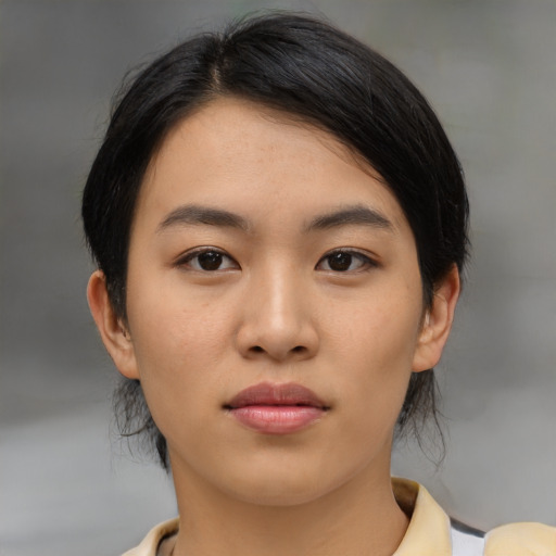 Neutral asian young-adult female with medium  black hair and brown eyes