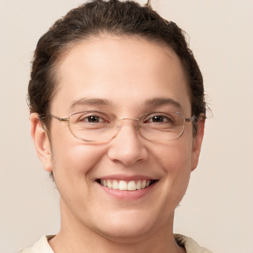 Joyful white adult female with short  brown hair and brown eyes