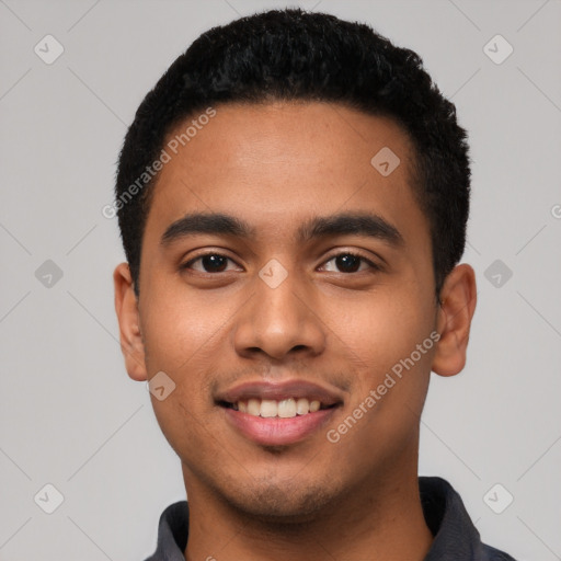 Joyful latino young-adult male with short  black hair and brown eyes