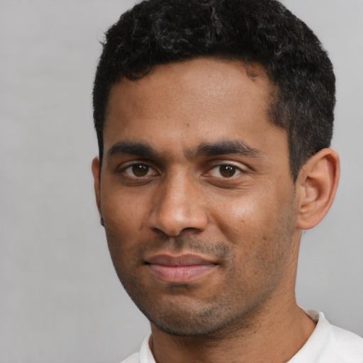 Neutral black young-adult male with short  black hair and brown eyes