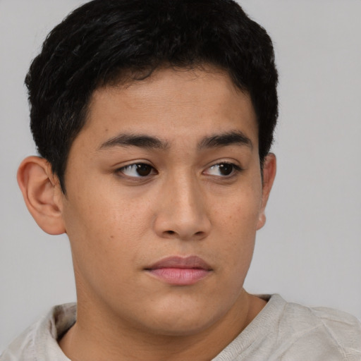 Neutral asian young-adult male with short  brown hair and brown eyes