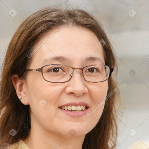 Joyful white adult female with medium  brown hair and brown eyes