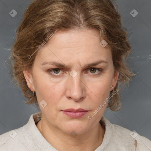 Joyful white adult female with medium  brown hair and grey eyes