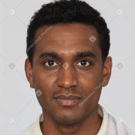 Neutral black young-adult male with short  black hair and brown eyes