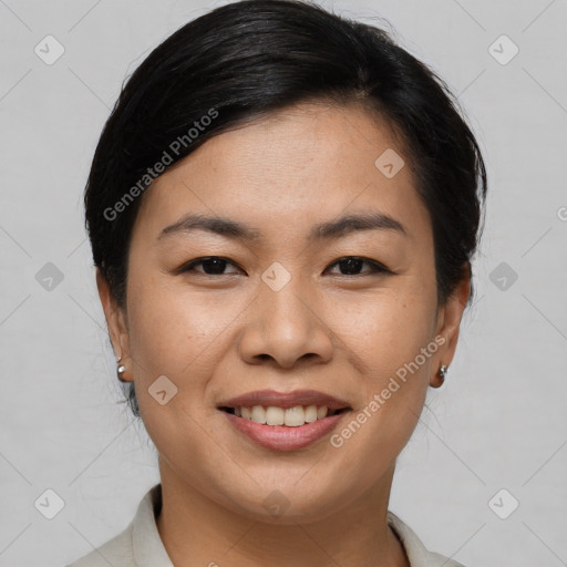 Joyful asian young-adult female with medium  brown hair and brown eyes