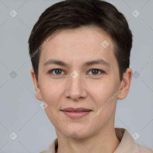 Joyful white adult female with short  brown hair and brown eyes