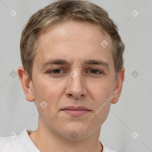 Joyful white adult male with short  brown hair and grey eyes