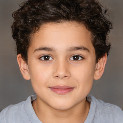 Joyful white child male with short  brown hair and brown eyes