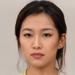 Neutral asian young-adult female with medium  brown hair and brown eyes