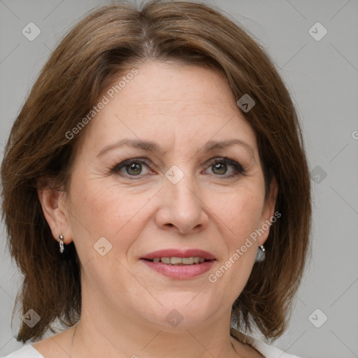 Joyful white adult female with medium  brown hair and grey eyes