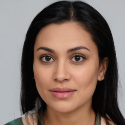 Joyful latino young-adult female with medium  brown hair and brown eyes