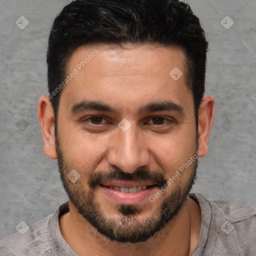 Joyful white young-adult male with short  black hair and brown eyes