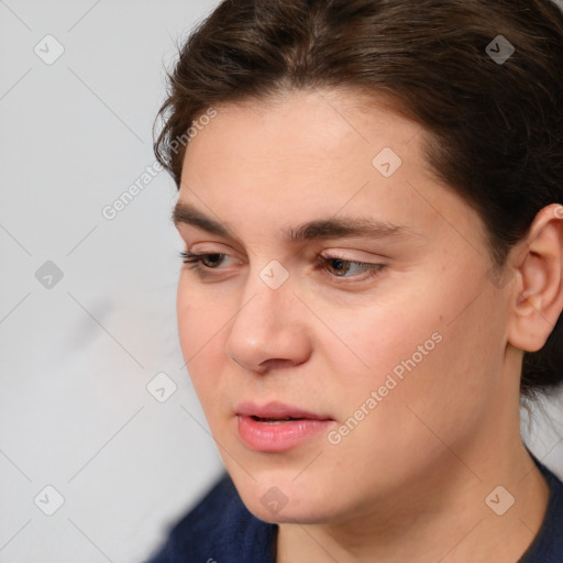 Joyful white young-adult male with medium  brown hair and brown eyes