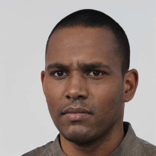Neutral black young-adult male with short  black hair and brown eyes