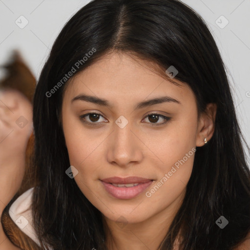 Joyful latino young-adult female with long  brown hair and brown eyes