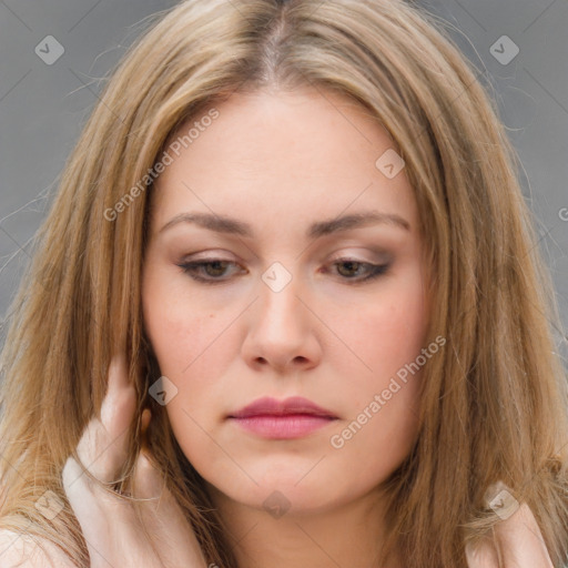 Neutral white young-adult female with long  brown hair and brown eyes